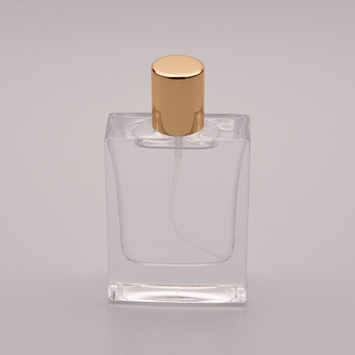 bouteille de parfum 50ml en verre plate avec le petit chapeau d'or